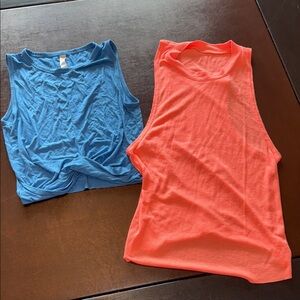 Two Alo Yoga workout tops